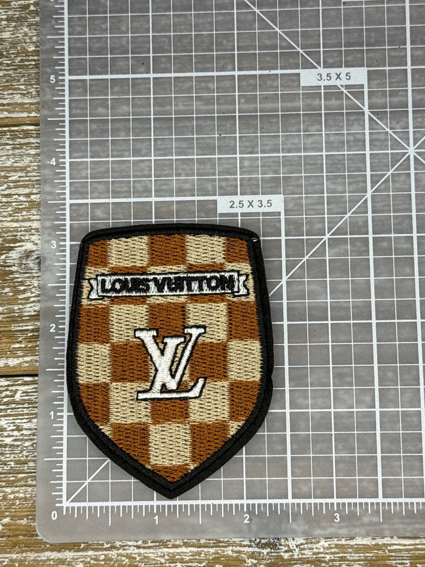 LV Checkered Shield