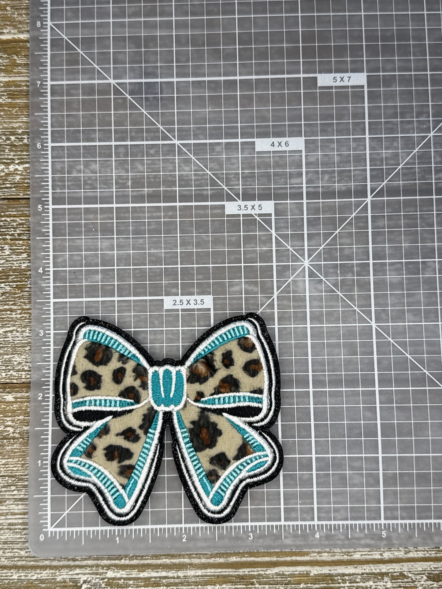 Soft Leopard Teal Bow
