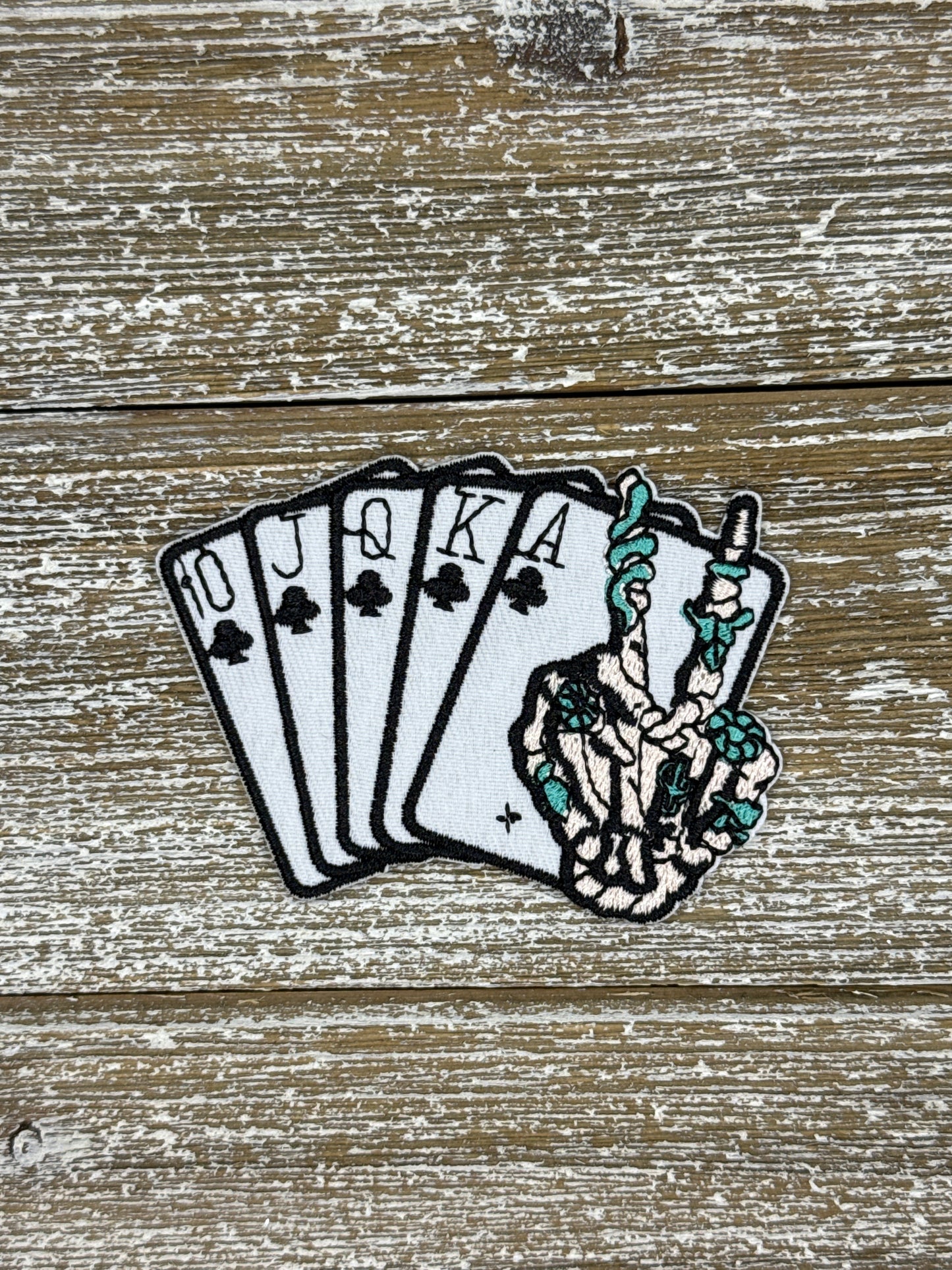 Royal Flush Skeleton Hand