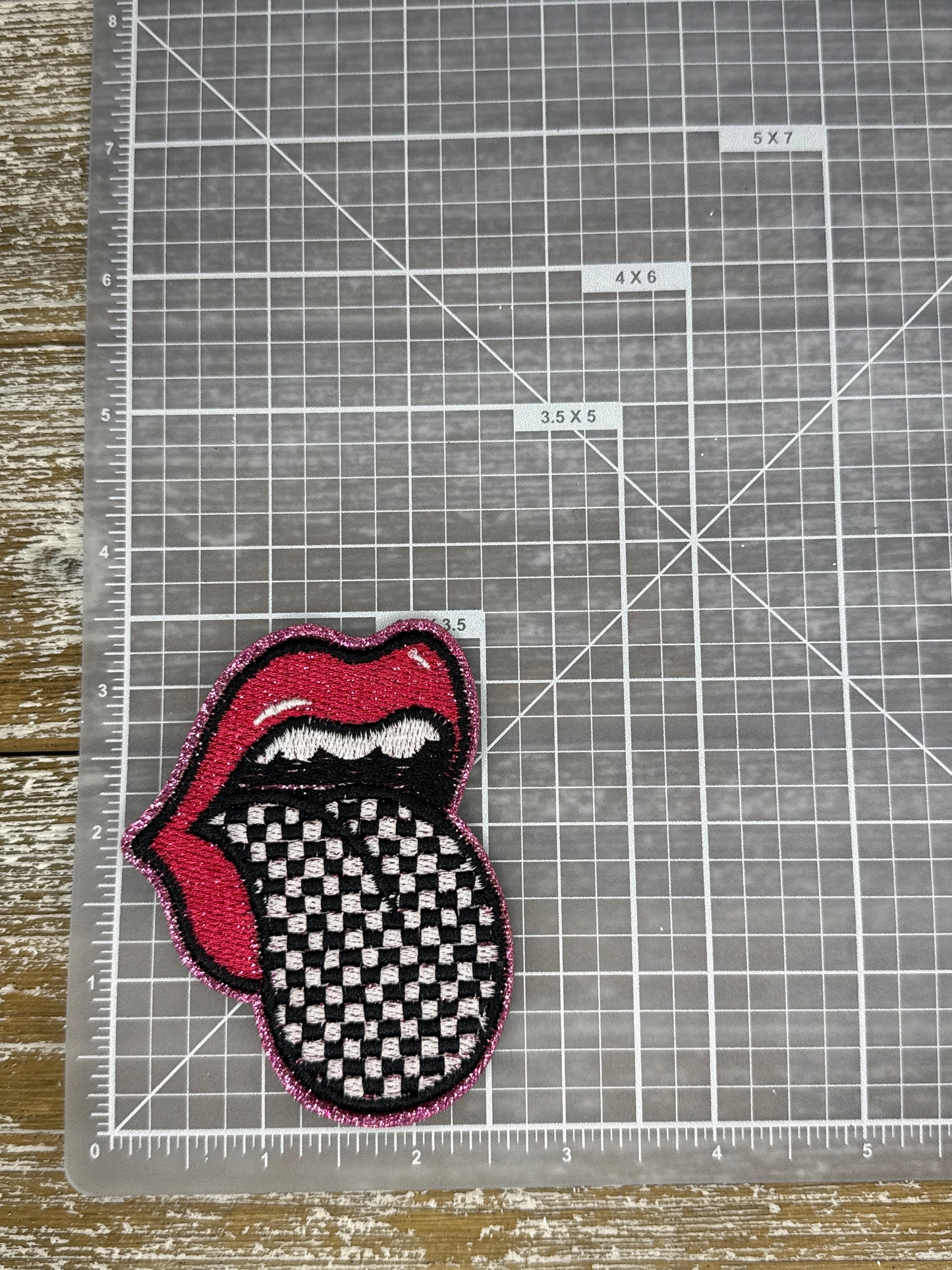Pink Glitter Checkered Tongue