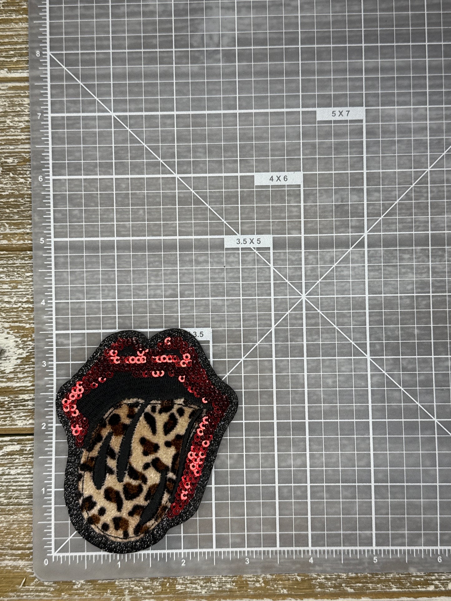 Sequin Lip and Fuzzy Leopard Tongue