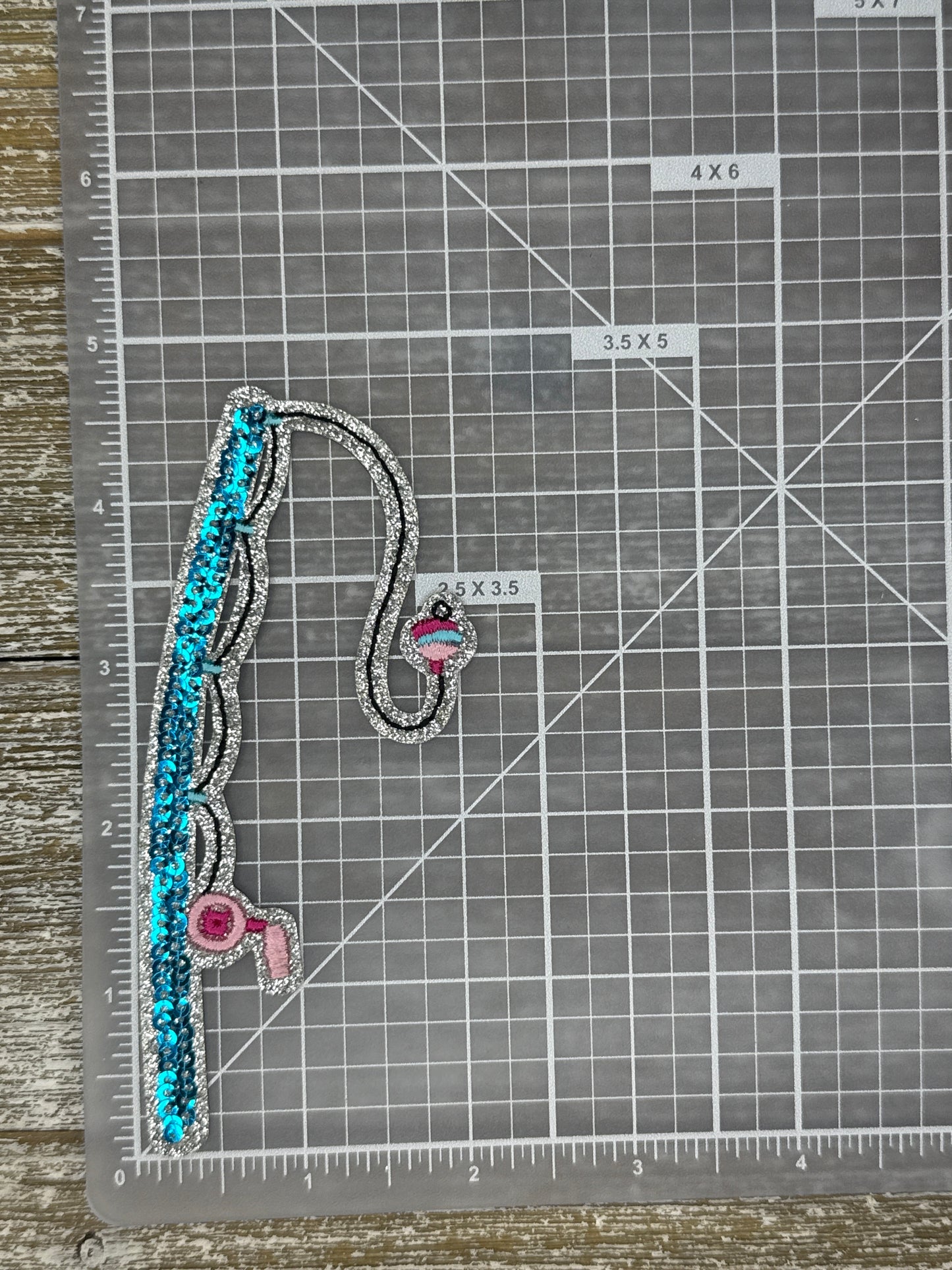 Blue Sequined Fishing Pole